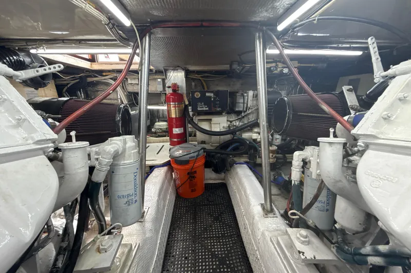 Slide: The Image of Engine room of 1992 Ocean Yachts 48 Super Sport with visible machinery and equipment. - 30