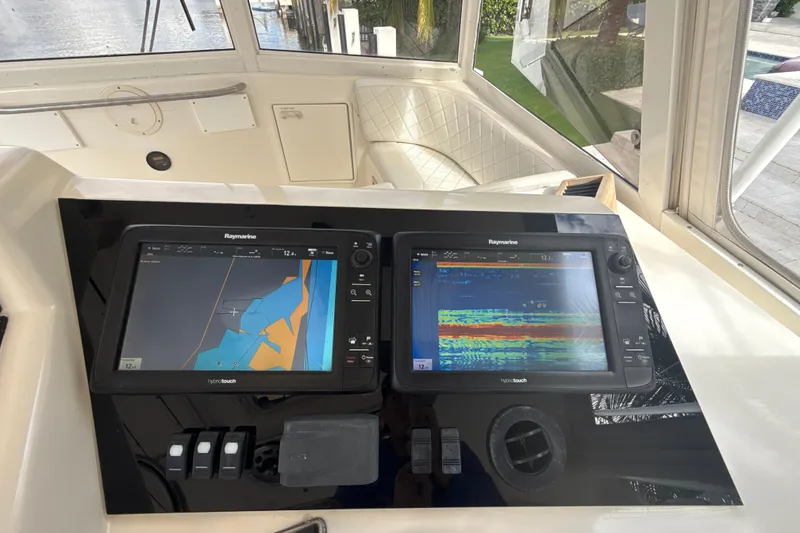 Slide: The Image of Control panel of a 1992 Ocean Yachts 48 Super Sport with Raymarine displays. - 23