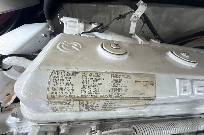 Slide: The Image of Engine compartment of a 1992 Ocean Yachts 48 Super Sport with Detroit Diesel specifications. - 35