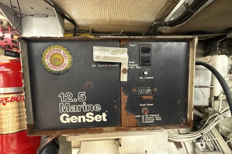 Slide: The Image of Marine generator control panel on a 1992 Ocean Yachts 48 Super Sport boat. - 39