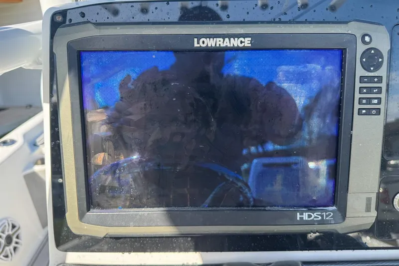 Slide: The Image of Lowrance HDS12 display on 2018 Blue Wave 2400 PureBay boat dashboard. - 45