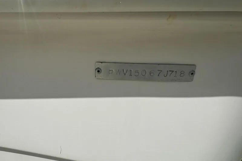 Slide: The Image of 2018 Blue Wave 2400 PureBay boat hull identification number plate. - 69