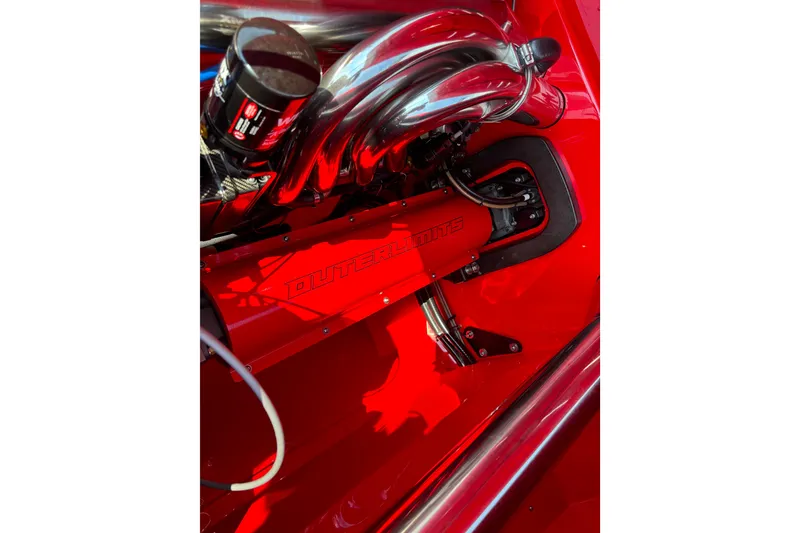 Slide: The Image of Close-up of 2022 Outerlimits SL41 engine in vibrant red. - 8