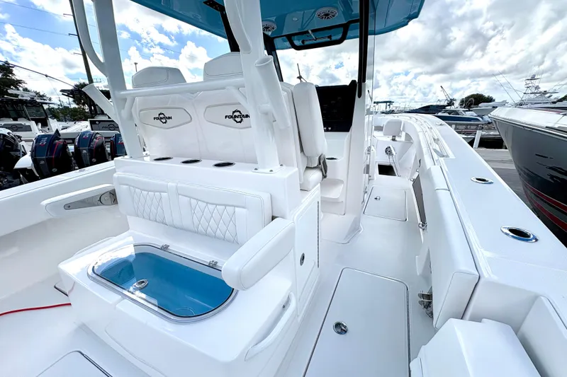 Slide: The Image of 2025 Fountain 38 Center Console boat with sleek white interior and modern design features. - 15