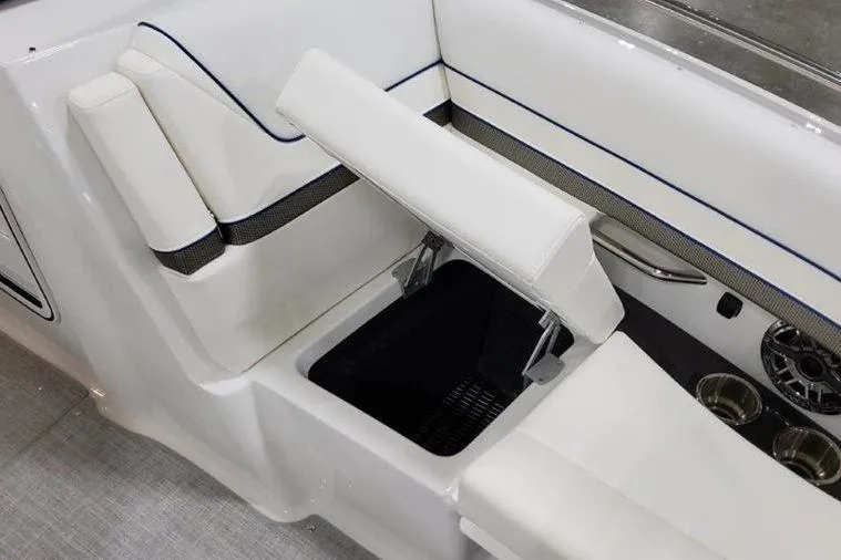 Slide: The Image of Interior of 2025 Formula 310 Bowrider I/O with storage compartment. - 18