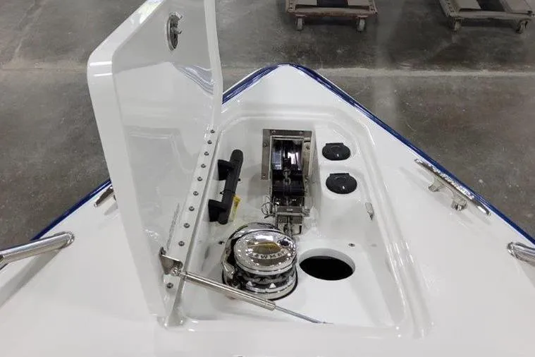 Slide: The Image of Anchor compartment of 2025 Formula 310 Bowrider I/O boat. - 19