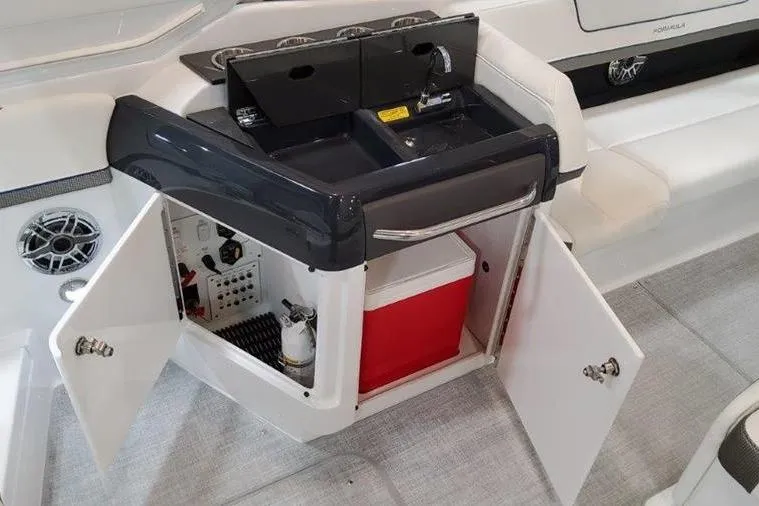 Slide: The Image of Interior of 2025 Formula 310 Bowrider I/O with sink and storage. - 26