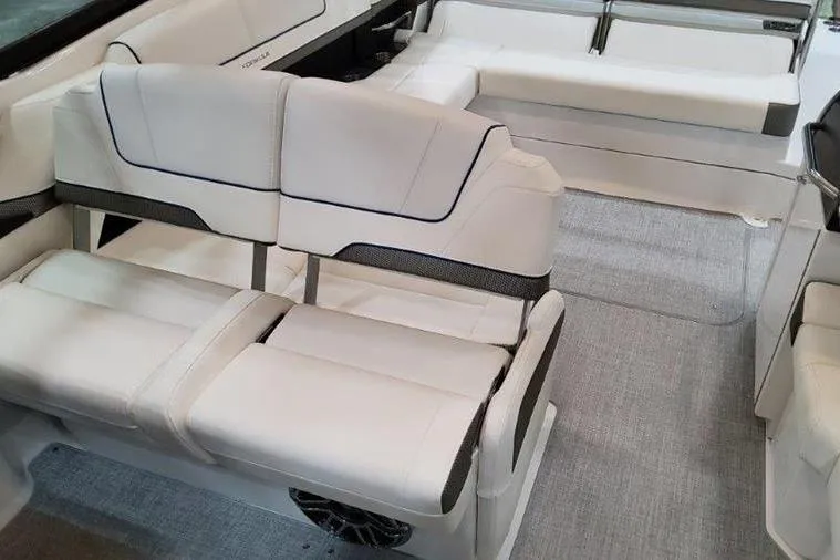 Slide: The Image of Interior of 2025 Formula 310 Bowrider I/O with white leather seating. - 28