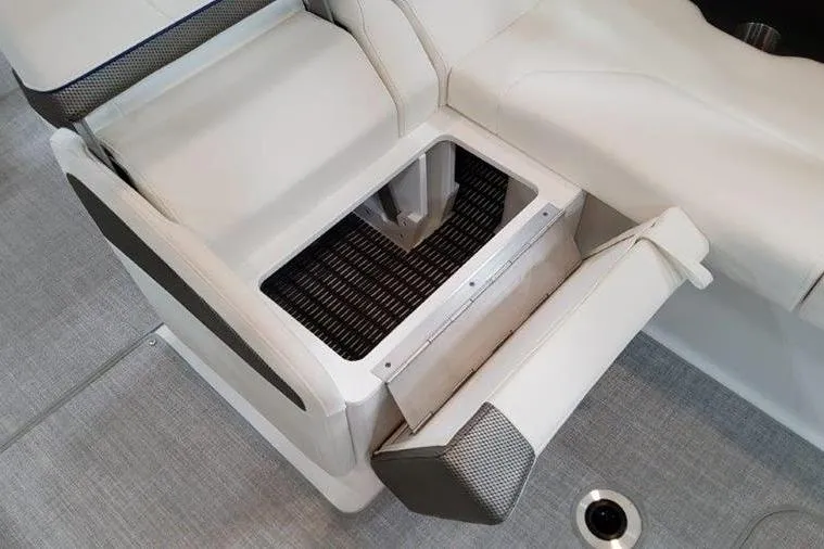 Slide: The Image of Interior of 2025 Formula 310 Bowrider I/O with storage compartment. - 29