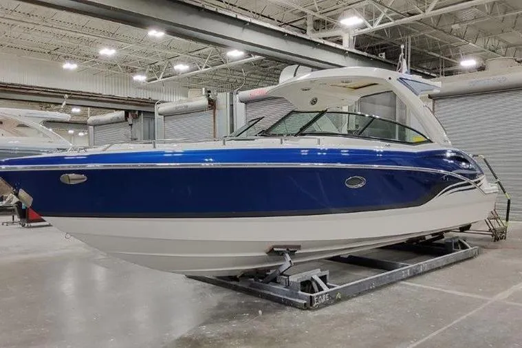 Slide: The Image of 2025 Formula 310 Bowrider I/O boat in a shipyard. - 32