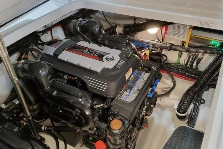 Slide: The Image of Engine compartment of 2025 Formula 310 Bowrider I/O with powerful engine. - 35