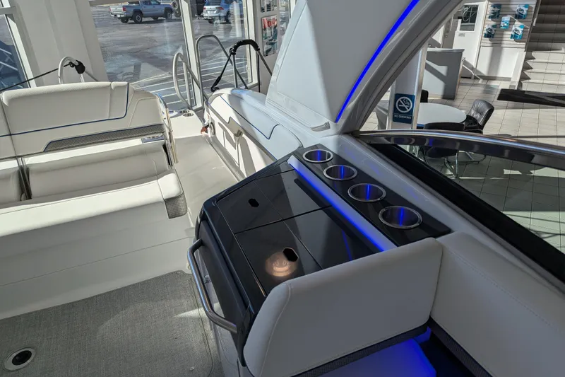 Slide: The Image of Interior of 2025 Formula 310 Bowrider I/O with blue lighting. - 6