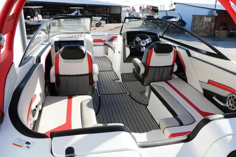 Slide: The Image of 2018 Yamaha Boats 242X E-Series interior with sleek seating and modern design. - 14