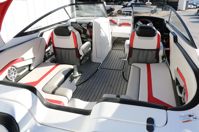 Slide: The Image of 2018 Yamaha Boats 242X E-Series interior with sleek seating and modern design. - 15
