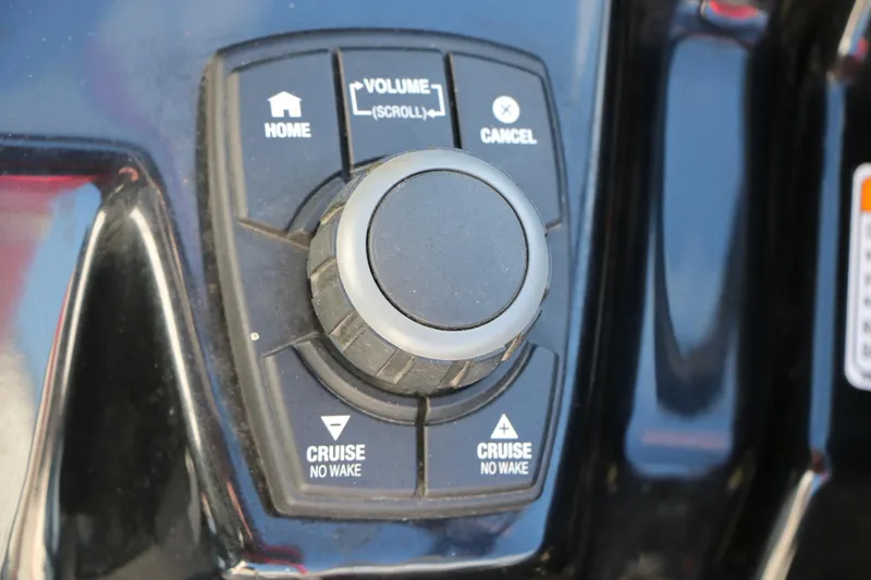 Slide: The Image of Control panel of 2018 Yamaha Boats 242X E-Series with volume and cruise options. - 29