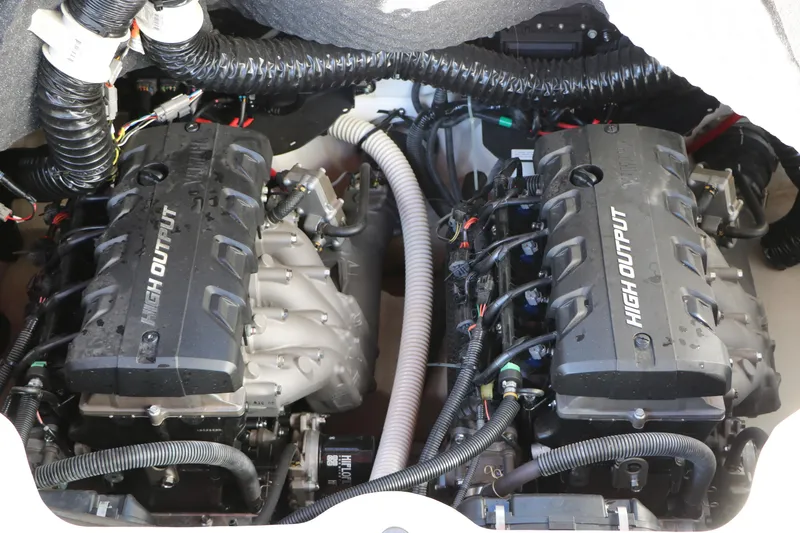 Slide: The Image of 2018 Yamaha Boats 242X E-Series high output engines in a boat compartment. - 30