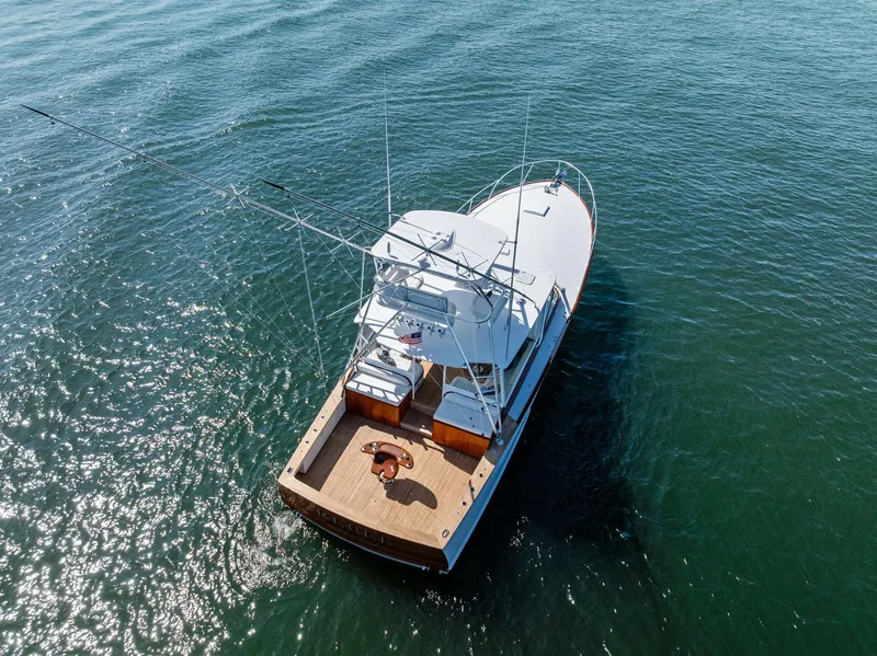 Slide: The Image of Rybovich Sportfish 2000 boat on open water, aerial view. - 10