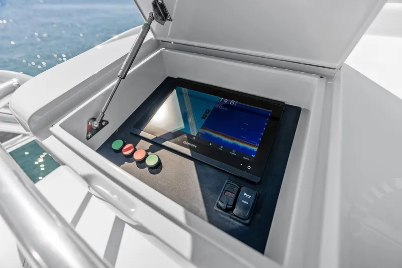 Slide: The Image of Control panel on a 2000 Rybovich Sportfish boat with touchscreen and buttons. - 17