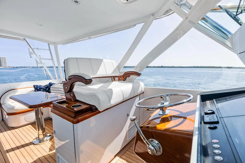 Slide: The Image of Luxurious 2000 Rybovich Sportfish yacht interior with elegant seating and steering wheel. - 29