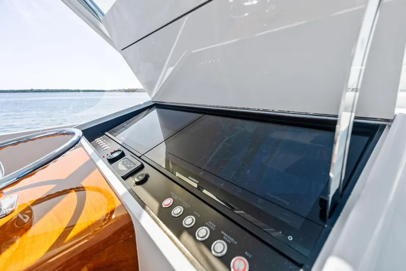 Slide: The Image of Control panel of a 2000 Rybovich Sportfish boat with sleek design and modern features. - 30