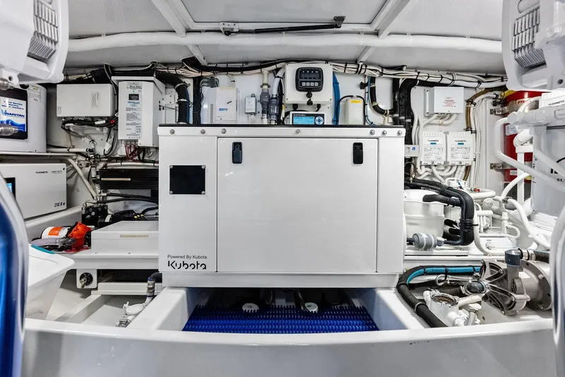 Slide: The Image of Engine room of a 2000 Rybovich Express with Kubota generator. - 43