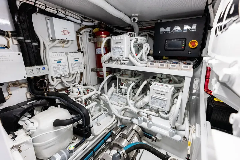 Slide: The Image of Engine room of a 2000 Rybovich Express with MAN engine. - 44