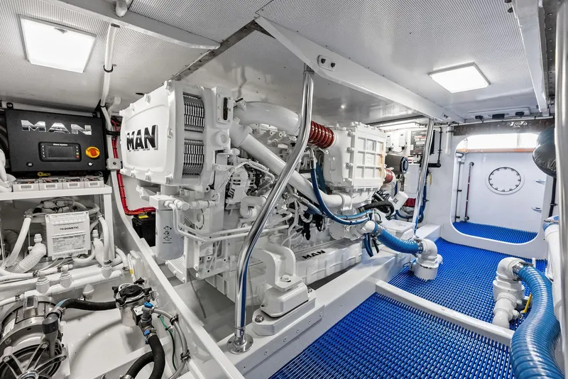 Slide: The Image of Engine room of a 2000 Rybovich Express with MAN engines. - 47