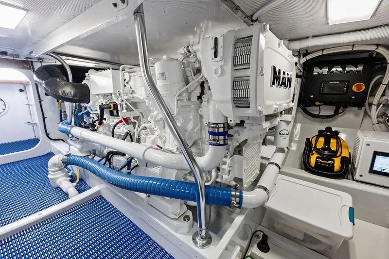 Slide: The Image of Engine room of a 2000 Rybovich Express with MAN engines. - 48