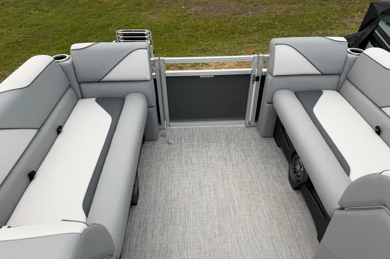 Slide: The Image of 2026 Avalon VENTURE QUAD LOUNGER interior with gray and white seating, outdoor setting. - 5