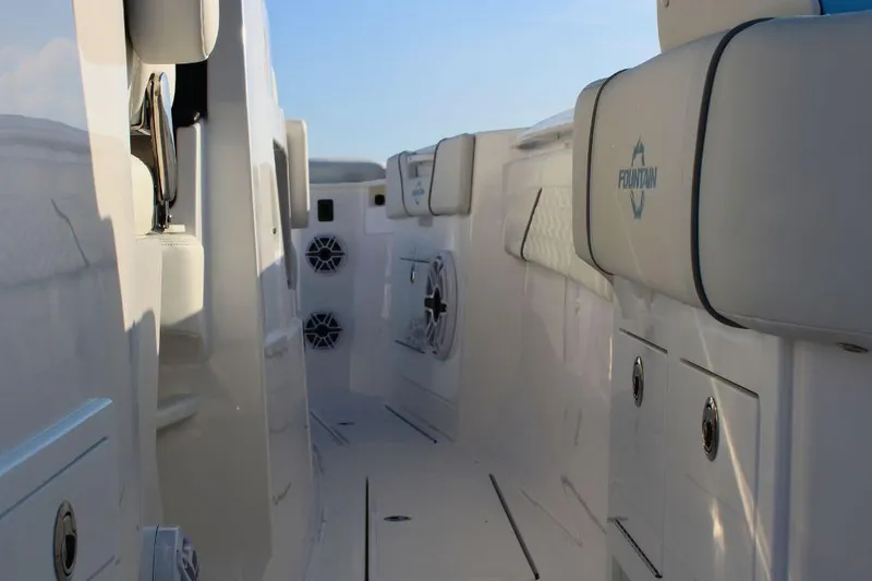 Slide: The Image of 2025 Fountain 38 SCX boat interior with sleek white seating and modern design elements. - 10