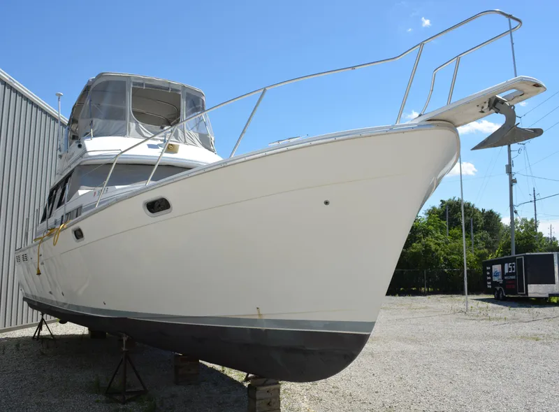 Slide: The Image of 1990 Bayliner 3888 Motoryacht on dry dock. - 2