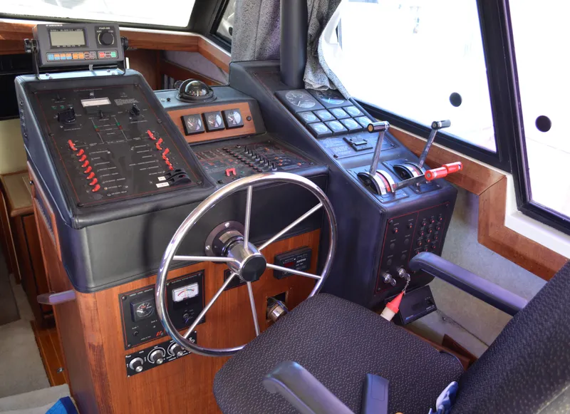 Slide: The Image of Interior view of a 1990 Bayliner 3888 Motoryacht helm. - 5