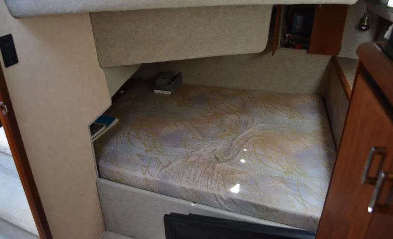 Slide: The Image of Interior of 1990 Bayliner 3888 Motoryacht with sleeping area. - 7
