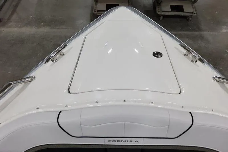 Slide: The Image of 2025 Formula 350 Crossover Bowrider I/O, sleek white bow design, top view. - 14
