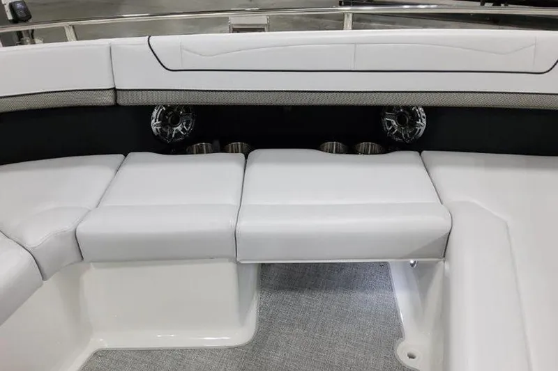 Slide: The Image of 2025 Formula 350 Crossover Bowrider I/O interior with white cushioned seating. - 16