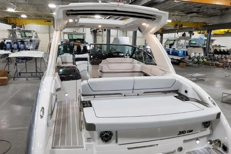 Slide: The Image of 2025 Formula 350 Crossover Bowrider I/O in a boatyard. - 25