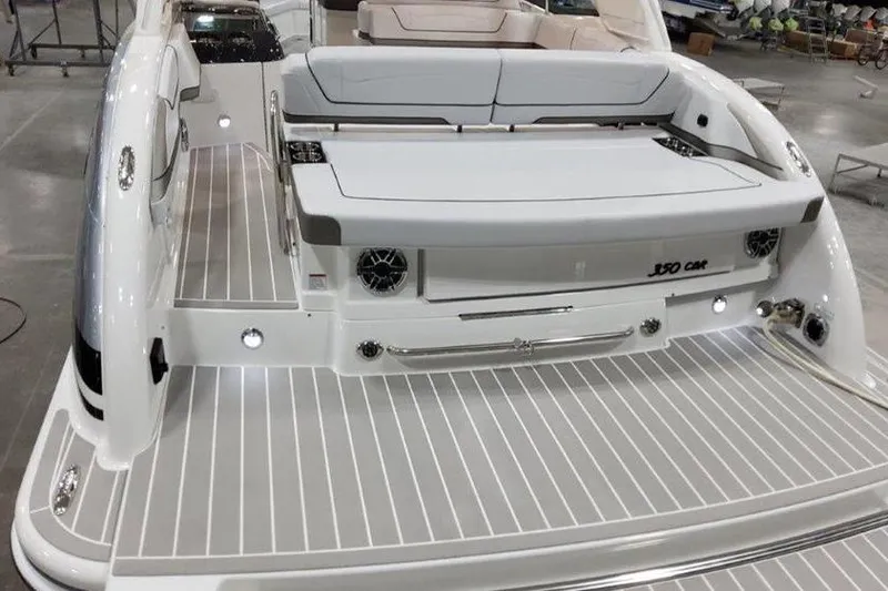 Slide: The Image of Rear view of 2025 Formula 350 Crossover Bowrider I/O boat. - 26