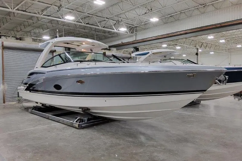 Slide: The Image of 2025 Formula 350 Crossover Bowrider I/O in a warehouse. - 28