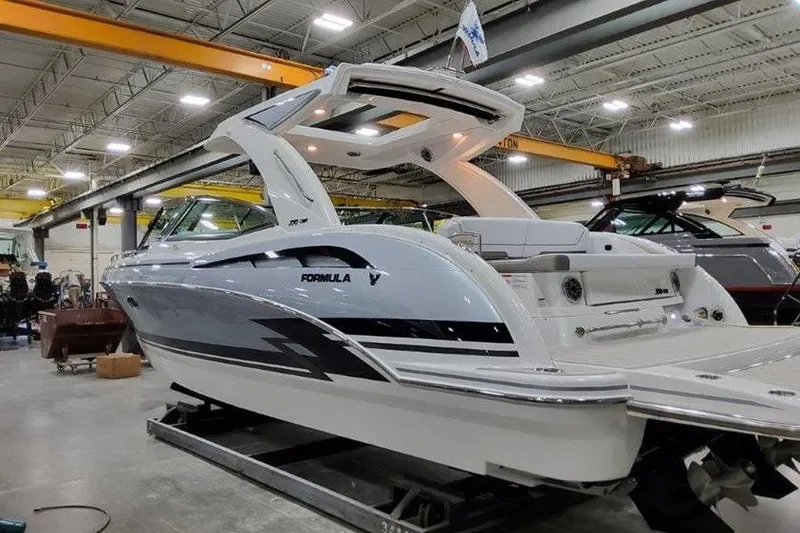 Slide: The Image of 2025 Formula 350 Crossover Bowrider in a shipyard. - 31