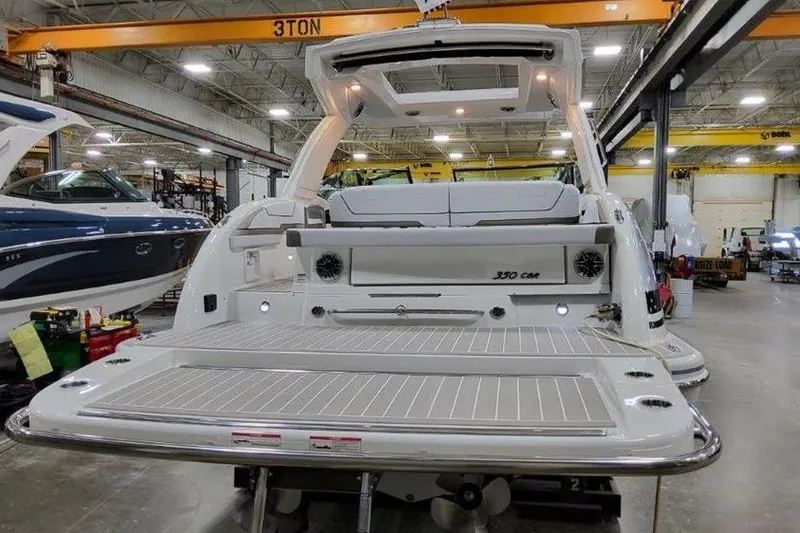 Slide: The Image of 2025 Formula 350 Crossover Bowrider in a showroom. - 32