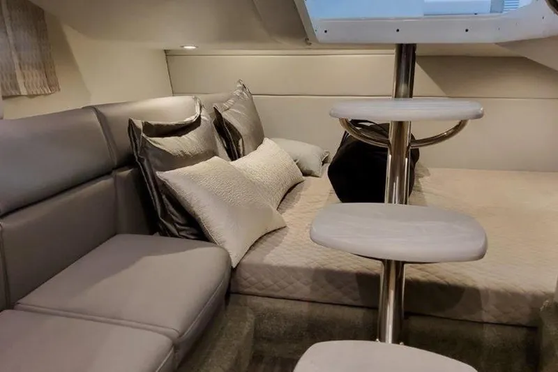 Slide: The Image of Luxurious interior of 2025 Formula 350 Crossover Bowrider I/O with plush seating and bedding. - 9