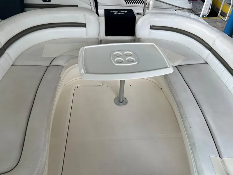 Slide: The Image of 2007 Sea Ray 44 Sundancer boat interior with white seating and table. - 20