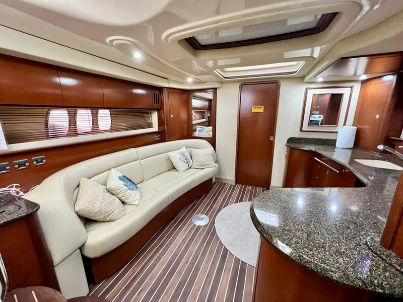 Slide: The Image of Luxurious interior of 2007 Sea Ray 44 Sundancer yacht with elegant seating and modern design. - 27
