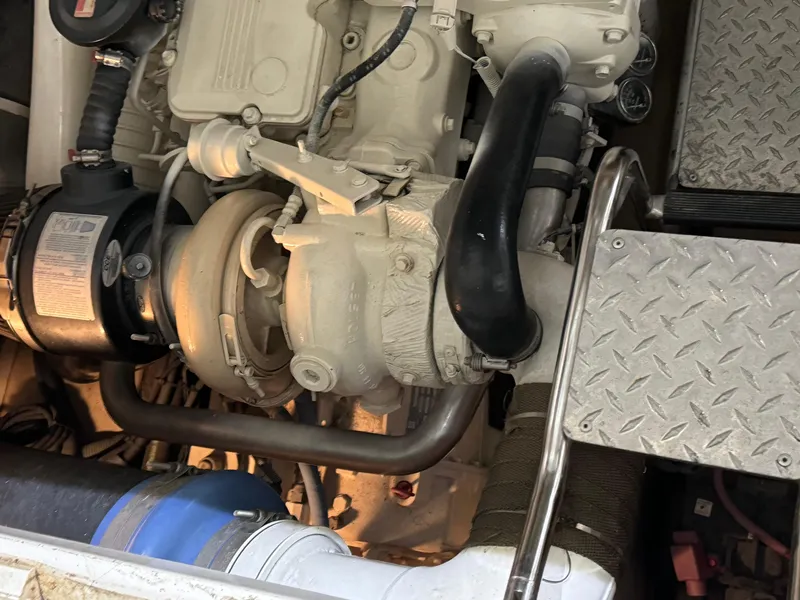 Slide: The Image of Engine compartment of a 2007 Sea Ray 44 Sundancer boat. - 32