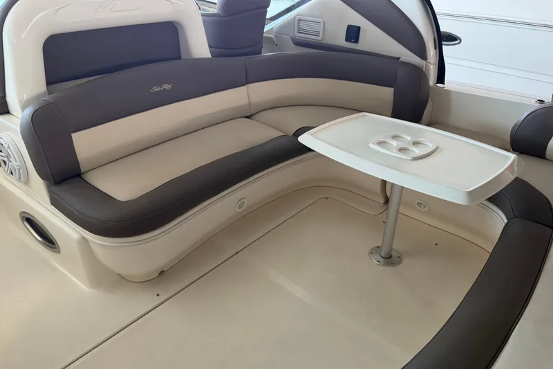 Slide: The Image of Luxurious seating area on a 2007 Sea Ray 44 Sundancer yacht with table. - 37