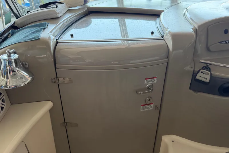 Slide: The Image of 2007 Sea Ray 44 Sundancer cabin door with chrome bell and lock mechanism. - 38