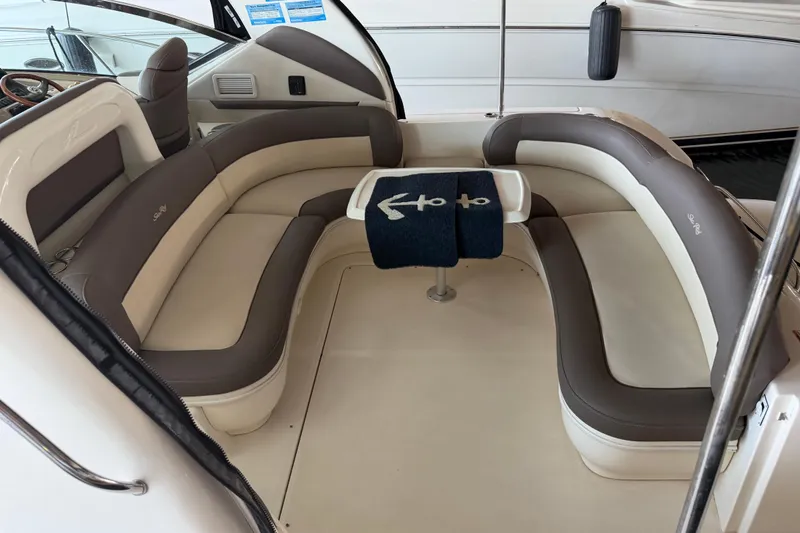 Slide: The Image of Luxurious seating area on a 2007 Sea Ray 44 Sundancer yacht with anchor-themed decor. - 40