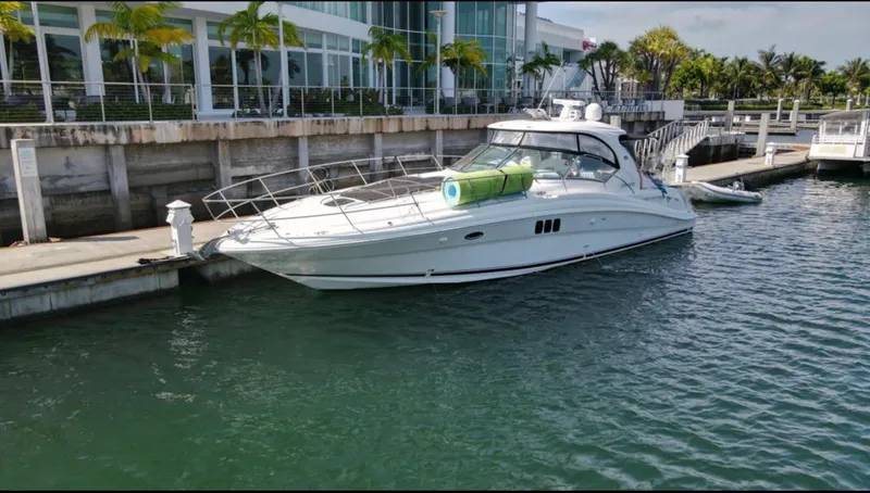 Slide: The Image of 2007 Sea Ray 44 Sundancer yacht docked at marina. - 5