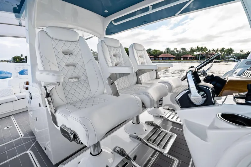 Slide: The Image of Luxurious interior of 2023 HCB 42 Lujo boat with plush white seating. - 24