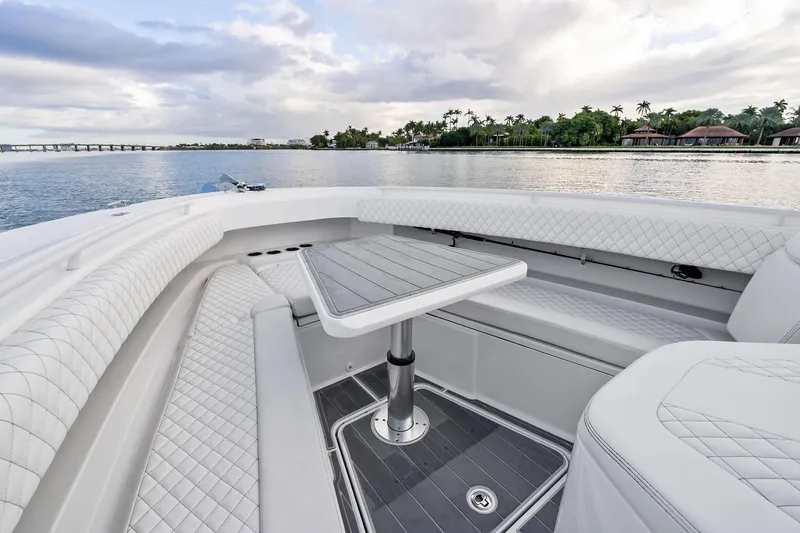 Slide: The Image of Luxurious seating area on 2023 HCB 42 Lujo boat with scenic waterfront view. - 30